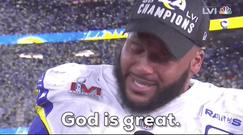 Los Angeles Rams defensive tackle Aaron Donald says God is great during an on-field interview after winning Super Bowl LVI.