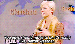 A woman gestures in front of a weather map and tells viewers to move to LA for better weather.