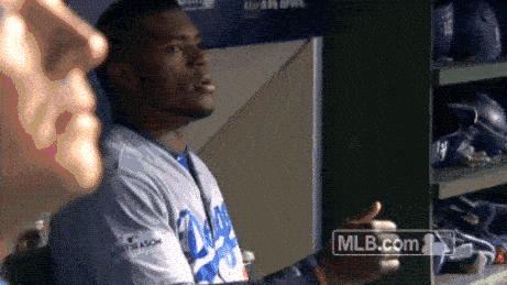 A Dodgers player celebrates in the clubhouse.