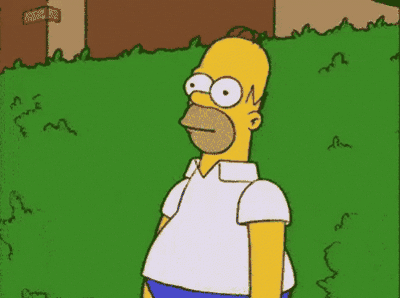 Homer Simpson leans back and falls into a hedge in the Fall Back intro animation.